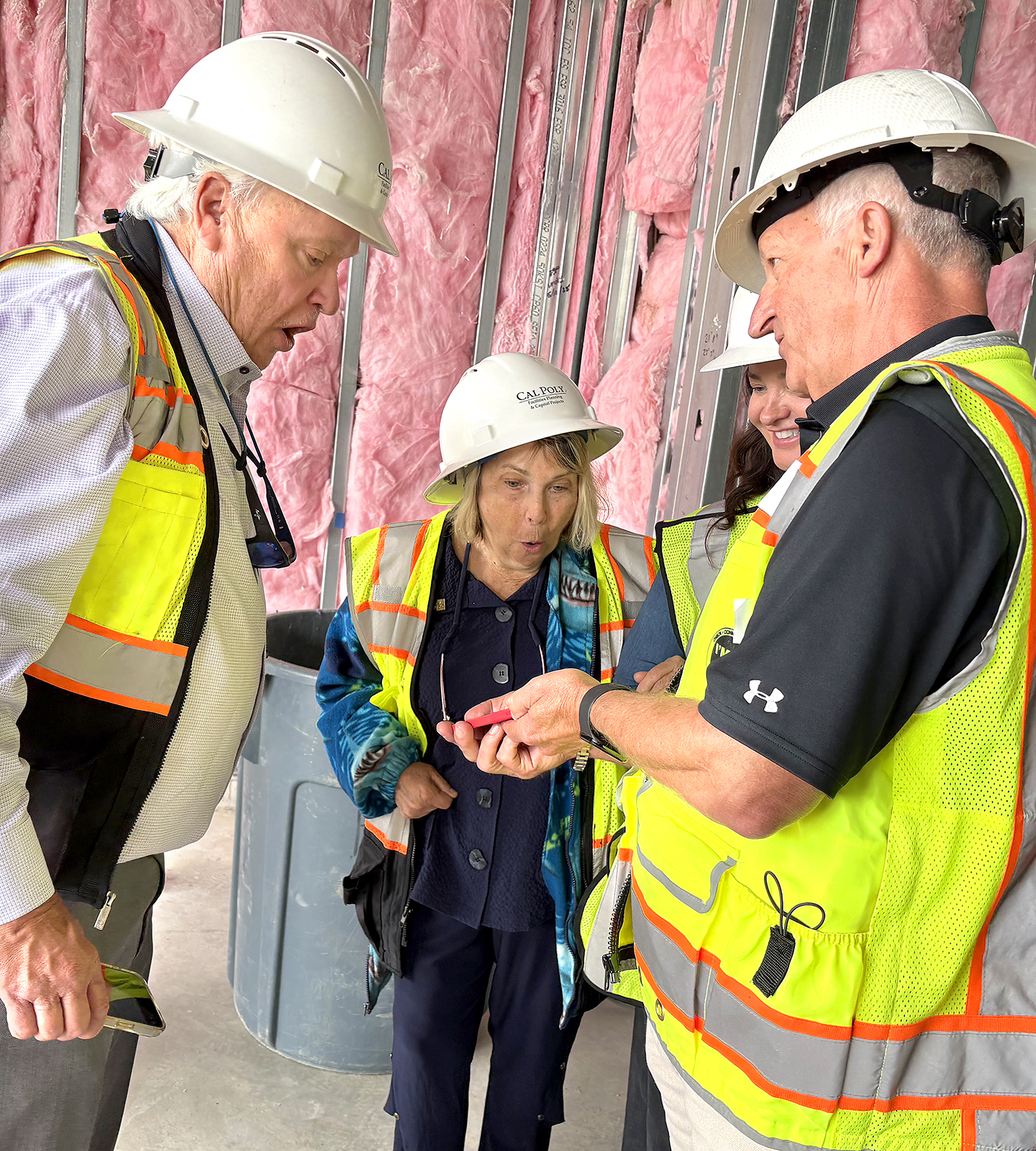 John and Cynthia Cook with George Gallagher, head of the Animal Science Department.