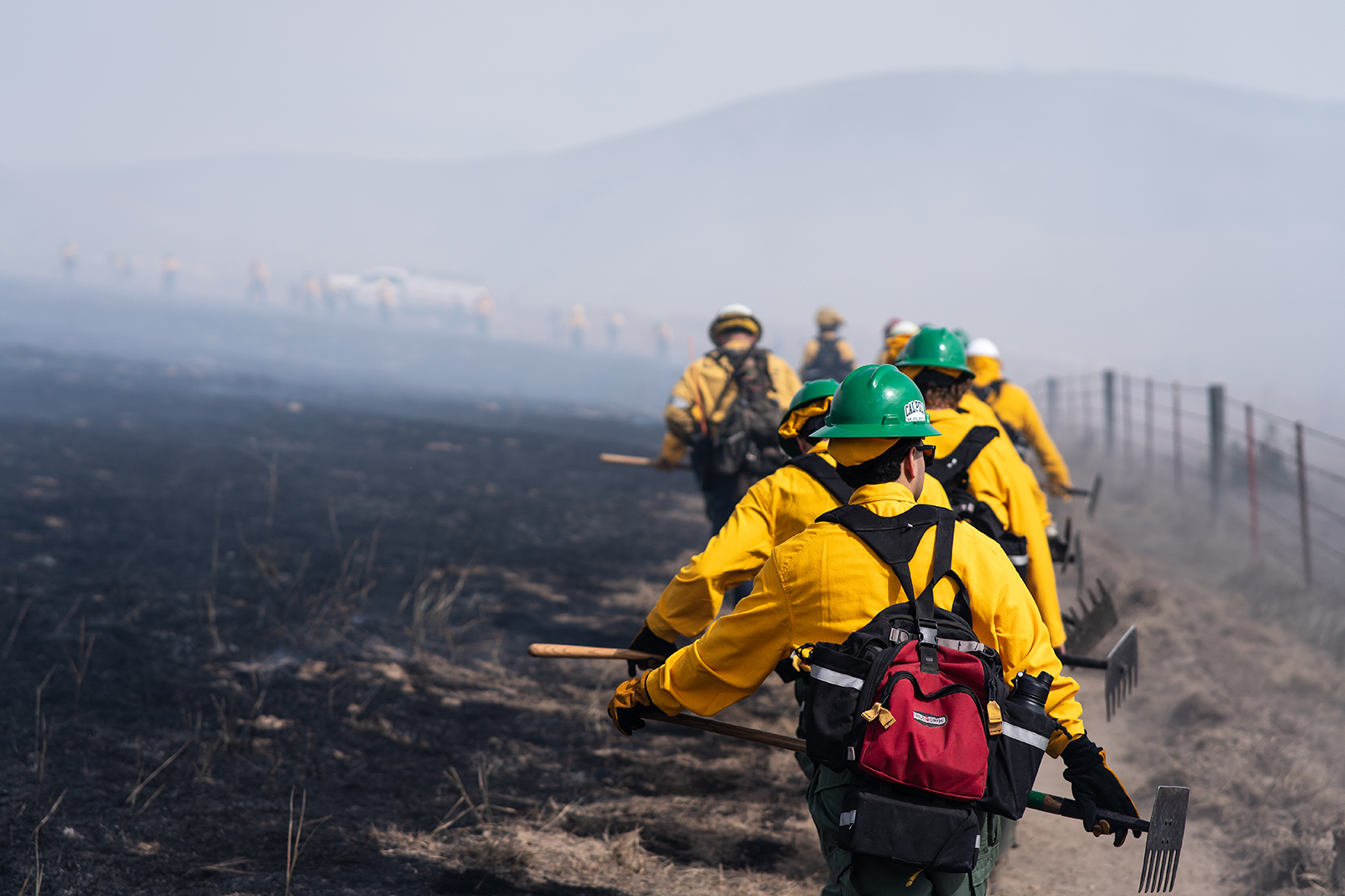 A student crew deploys to check for hot spots. 