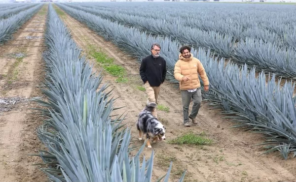 Stuart Woolf with his son at the ranch. 
