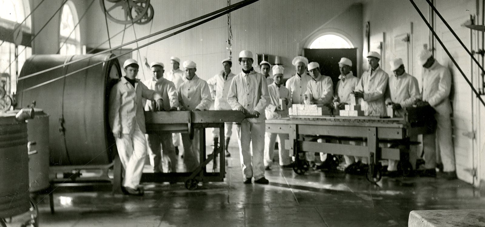Students packaging butter in the Creamery, circa 1910. Photo attributed to Frank Aston. Courtesy University Archives.