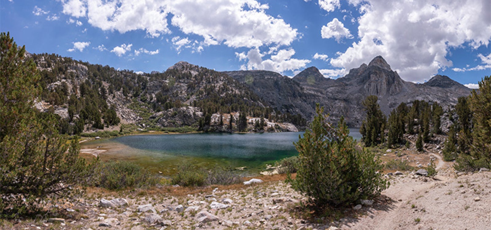Image of a lake and mountains in the background
