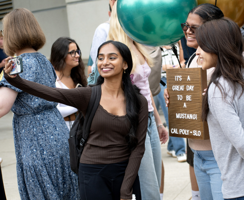 Students take selfies together on the first day of fall quarter 2025. 