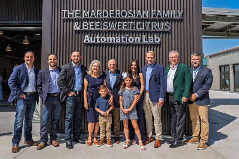 The ribbon cutting for the Marderosian Family and Bee Sweet Citrus Automation Lab. 