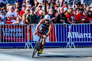 Mark Barr rides a bike as he competes at the Paris Olympic games. 