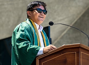 Marc Cabeliza speaks at commencement. 