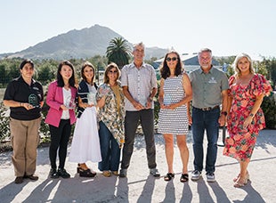 Staff and faculty from the College of Agriculture, Food and Environmental Sciences pose for a photo following the faculty and staff awards banquet. 