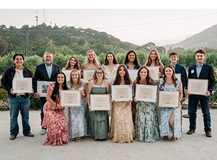 The dean of the College of Agriculture, Food and Environmental Sciences poses with the student recipients of the Leadership Awards. 