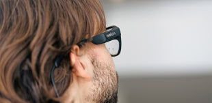 A man testing out the eye tracking glasses and Virtual Reality technology 