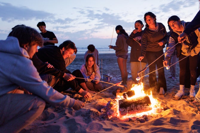 LIVE BY THE BEACH and learn to surf with free lessons. 