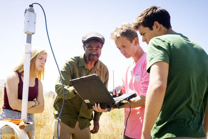 College of Agriculture, Food and Environmental Sciences images. With Dr. Bwalya Malama and students monitoring a well on campus.