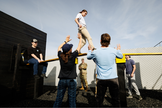 Students in the Facilitation and Teambuilding class run through the Leader’s Reaction Course at Camp San Luis Obispo. 