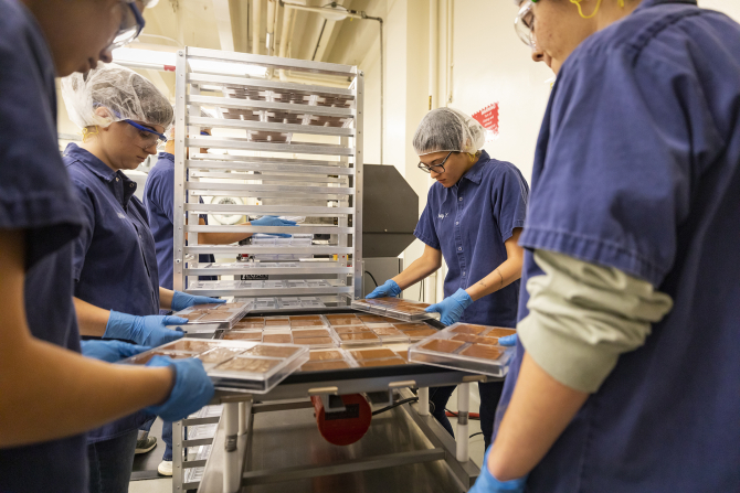 Student employees produce Cal Poly Chocolates Milk Chocolate bars for sale on campus and around San Luis Obispo County.
