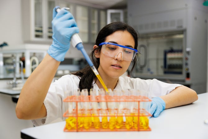 A Food Science master student researching how to convert olive pomace into a renewable energy source.