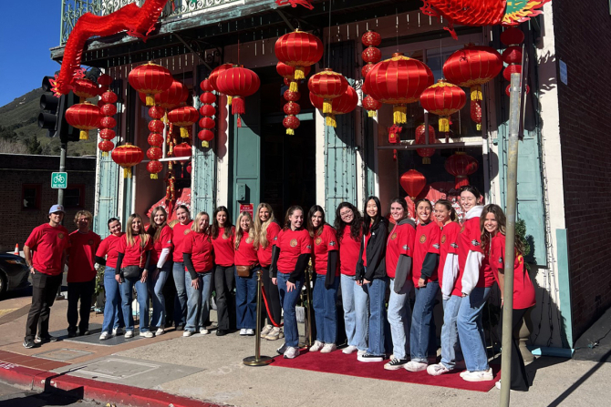 Students take a break before the start of the Lunar New Year celebration in San Luis Obispo. 