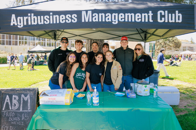 Students from the Agribusiness Management Club welcome visitors at Open House. 