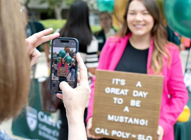 Students take photos on the first day of fall quarter 2025. 