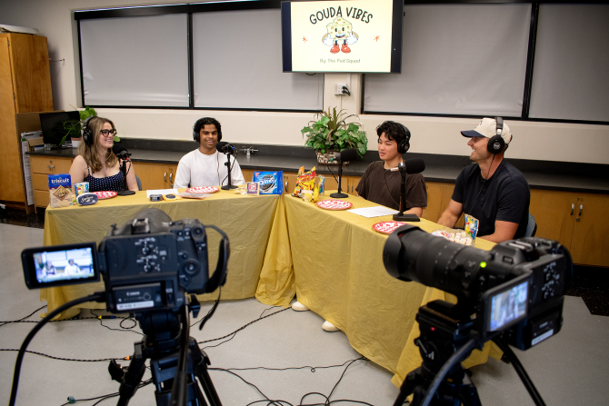 Students interview a dairy industry professional for their Gouda Vibes podcast. 