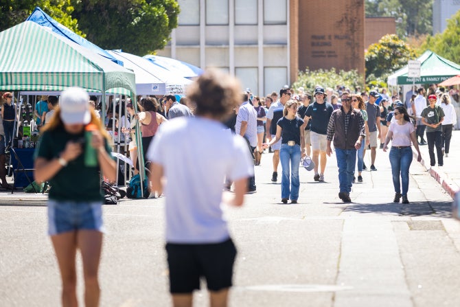 Students walk with their supporters at Open House. 