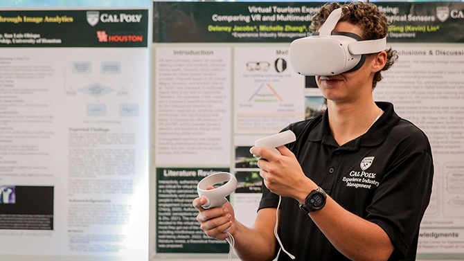 A student uses virtual reality glasses as part of a class project. 