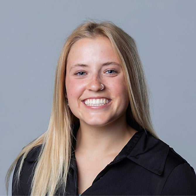 Zoey Buchanan smiles at the camera. 