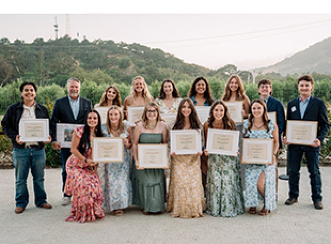 The dean of the College of Agriculture, Food and Environmental Sciences poses with the student recipients of the Leadership Awards. 
