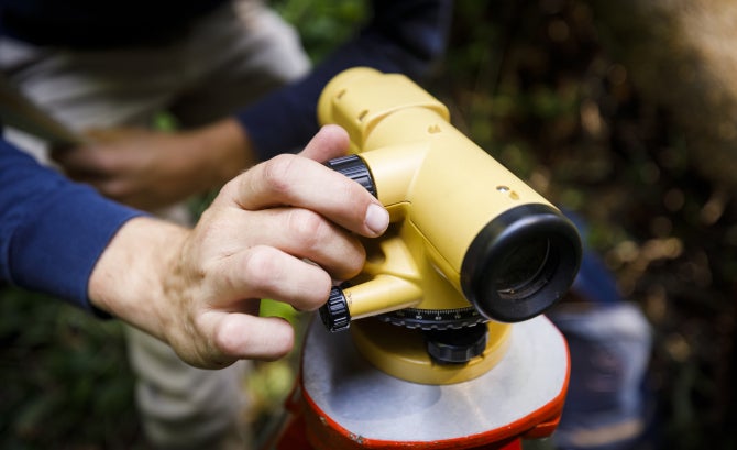 Students working in the field learning photo-monitoring methods, hydrologic instrumentation, survey channel morphology and analyze acquired field data.
